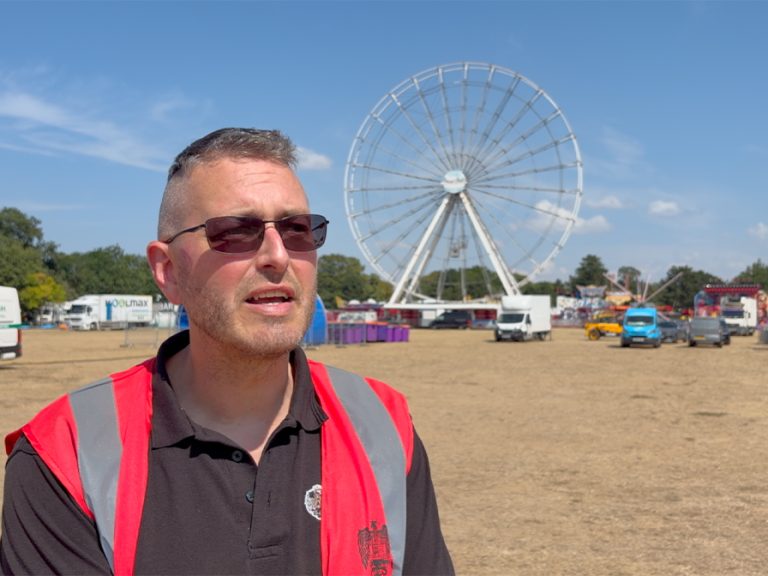 Bjon Hove, Bedford Borough Council's lead events and infrastructure officer, in Russell Park ahead of the 2026 Bedford River Festival. Behind him the big wheel is being erected and workers are putting up stalls and other attractions. Image: Bedford Independent.