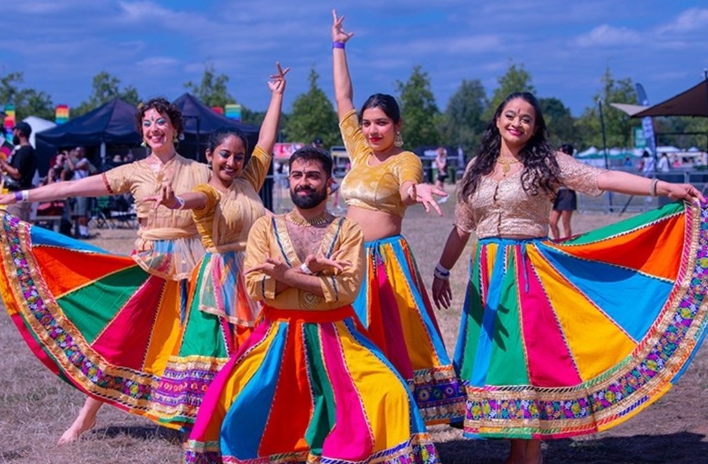 Bollywood dancers in brightly coloured outfits