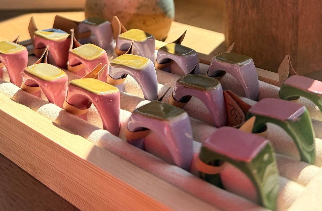 Ceramic rings in a display box in the sunshine at Bedford & Co. at The Arc