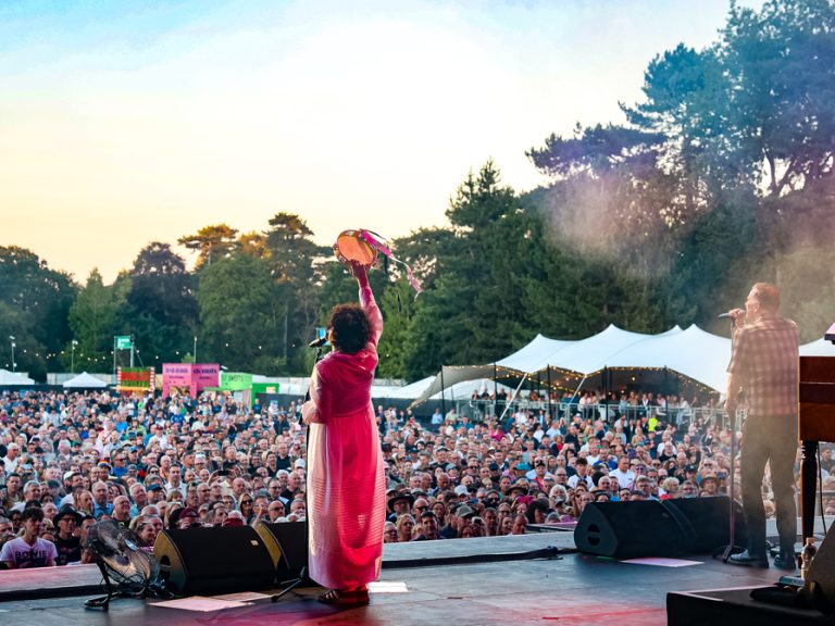 Lorraine McIntosh and Ricky Ross of Deacon Blue on stage as the sun sets at Bedford Summer Sessions 2026. Image Cuffe & Taylor