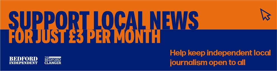 Support Local News orange and black supporters banner
