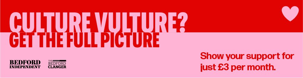 Culture - full picture Pink and Red supporters banner