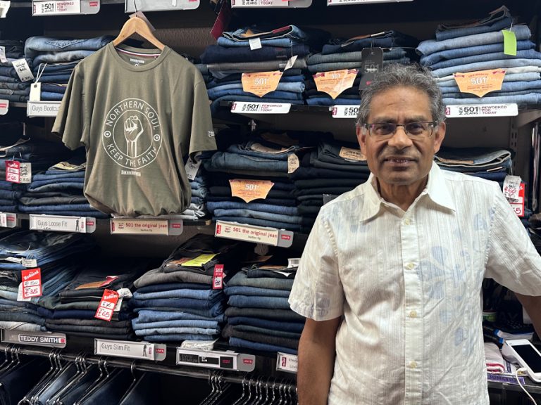 Pankaj Shah, the owner of Funky Junction, pictured in the Bedford High Street shop, in front of racks of jeans