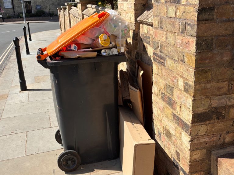 The overflowing wheelie bin outside Sacred Heart of Jesus and St Cuthbert Church, Mill Street Image Parish Community