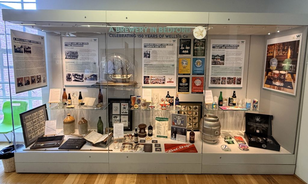 Wells & Co 150th display at the Higgins Museum