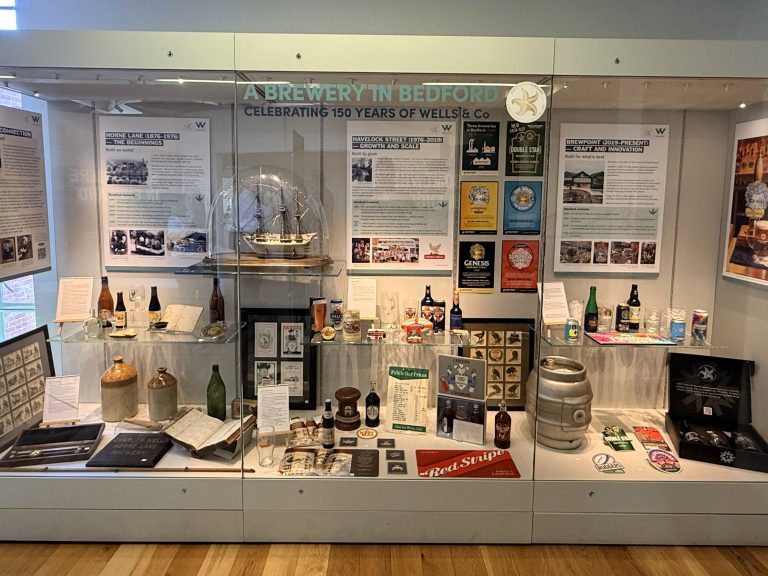 Wells & Co 150th display at the Higgins Museum