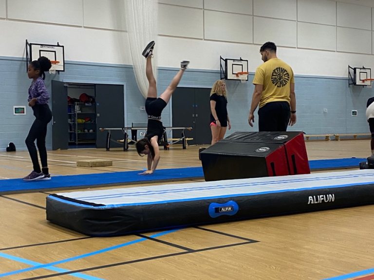 Young Bedfordians taking part in a gymnastics class as part of summer holiday activities in Wixams Image supplied by empr