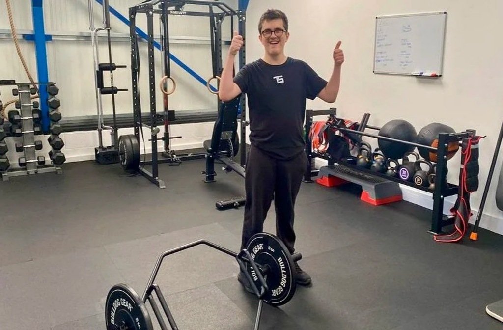 A happy client with his thumbs up in Barnes Active gym in Stagsden