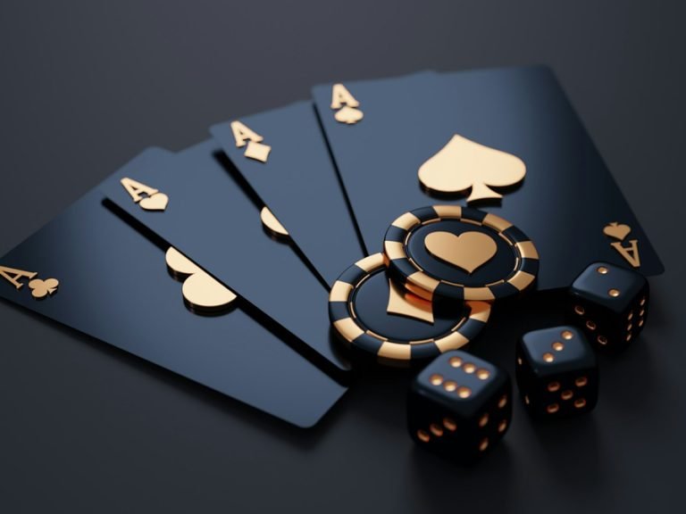 Black and gold playing cards, dice and casino chips. Image Unsplash