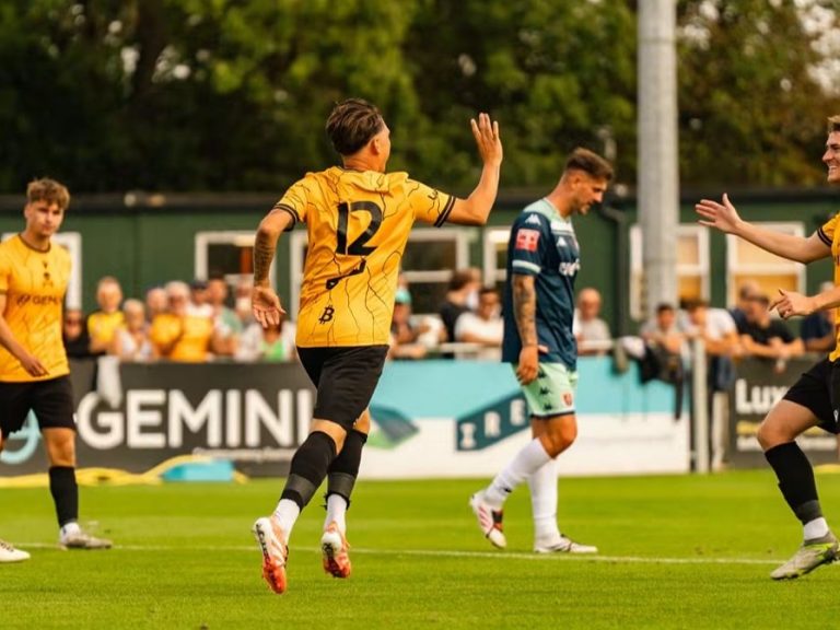 Real Bedford striker, Tom Hitchcock celebrates a goal with Elliot Simmons at the Ledger Stadium