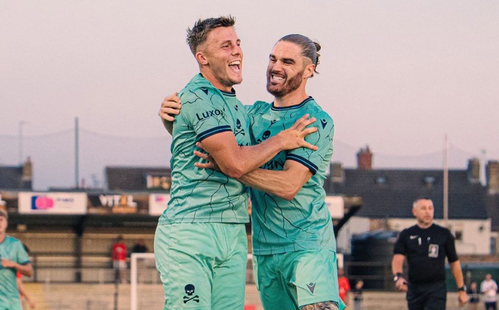 Josh Allen (left) and Jordan Ponticelli (right) of Real Bedford celebrating a goal.