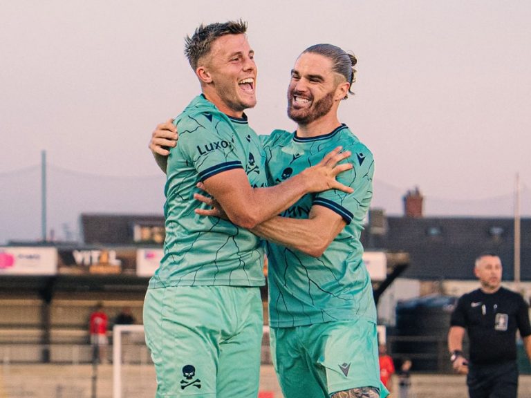 Josh Allen (left) and Jordan Ponticelli (right) of Real Bedford celebrating a goal.