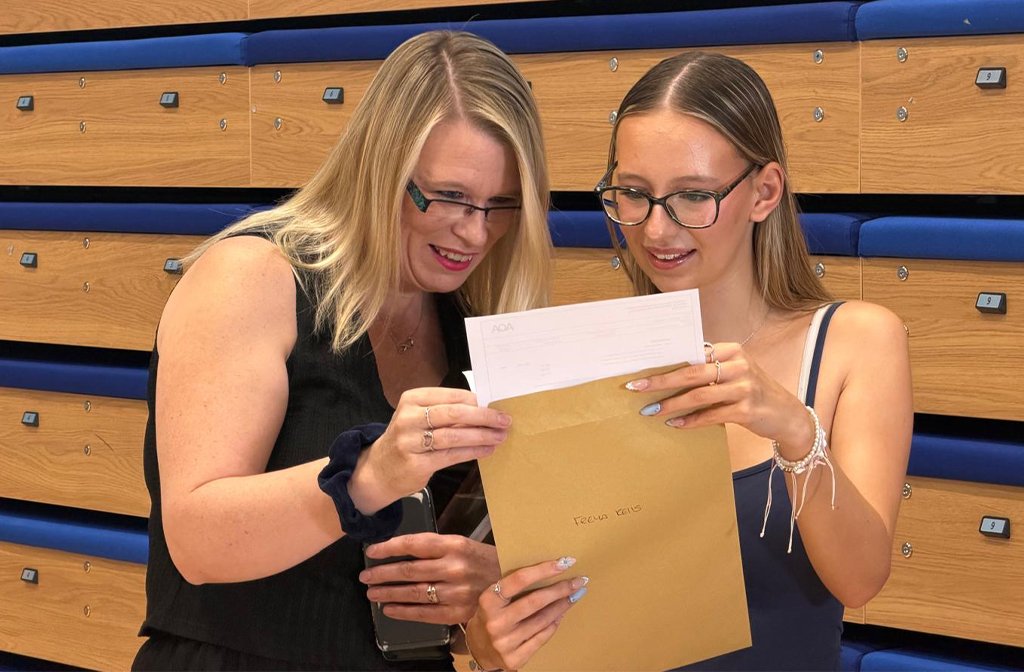 Wixams Academy student and parent collecting A-level results 13 August 2026. Image: Wixams Academy.