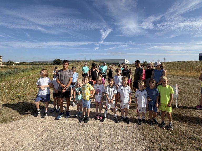 A group of young runners before the Wixams Junior Parkrun in July 2026