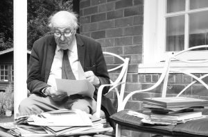 Local historian Simon Houfe in the garden of Avenue House in Ampthill surrounded by papers. Image Houfe family