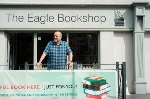 Owner Peter Budek outside the Eagle Bookshop on St Peter's Street in Bedford. Image Cameron Scrimgeour