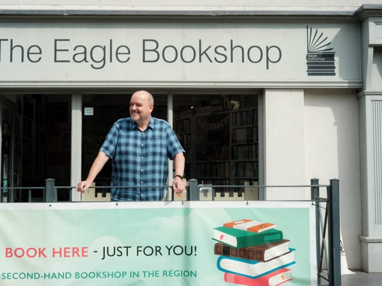 Owner Peter Budek outside the Eagle Bookshop on St Peter's Street in Bedford. Image Cameron Scrimgeour