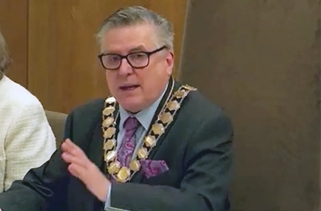 Bedford council speaker denies threats and weapon charges